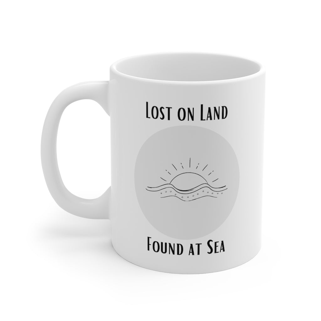 Lost on land mug